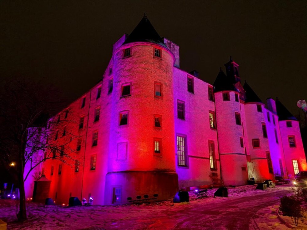 Dudhope Castle illuminated pink by Dundee by Light